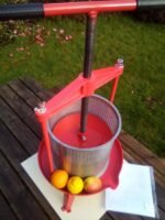 Cross beam fruit press with stainless steel basket - top