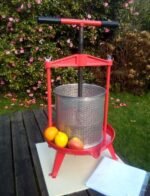 Cross beam fruit press with stainless steel basket - front