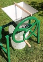 Manual Apple Crusher with Heavy Flywheel, Stainless Steel Hopper and Cutting Blades - on a stand